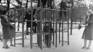 Children on jungle gym at Child Study Center circa 1925