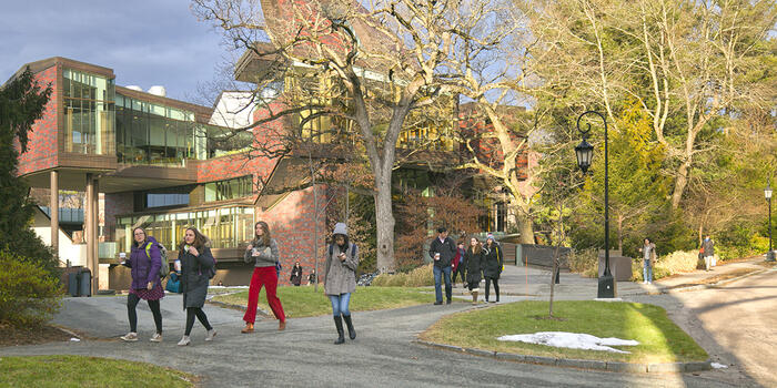 people walking across campus in front of the Lulu