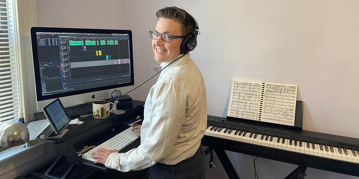 K.E. Goldschmitt working at their desk