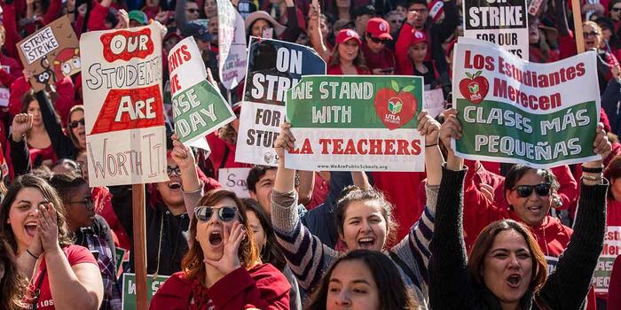 Teachers strike for higher wages.