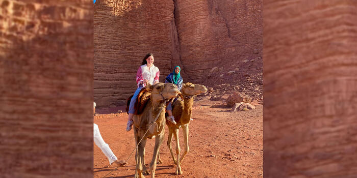 collage of students on camels in the desert of Jordan