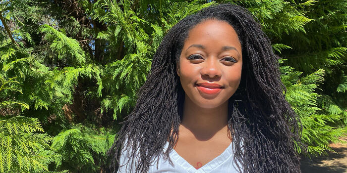 Nia Goodridge smiles into the camera.