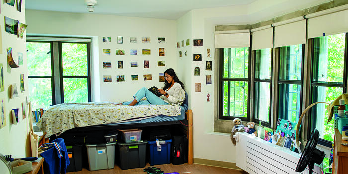 Severance House President Anjali Aralikar ’23 relaxes in her renovated dorm room.