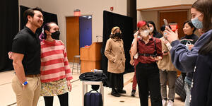 Schuyler Bailar poses for photos with students after his presentation