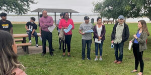 Catherine McCandless talking with Boston residents over the summer about potential climate adaptation s