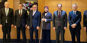 Sara Minkara, U.S. Special Advisor on International Disability Rights stands with ambassadors from C5 countries.
