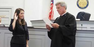 Alex Joseph ’10 being sworn in as a prosecutor
