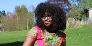 Sylvia Matua poses for a photo outside.