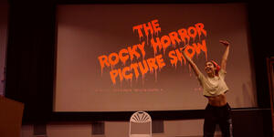 A student dances onstage at Wellesley's October 2022 shadowcast production of Rocky Horror Picture Show.