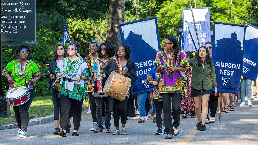 Students lead the procession to the theater