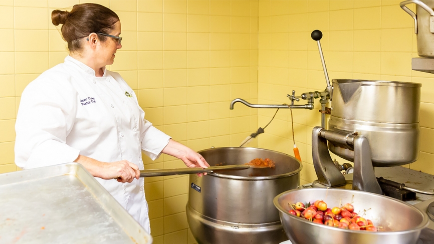 Wellesley pastry chef mixes crabapple sauce.