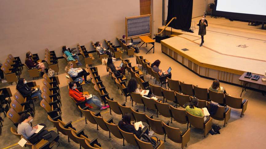 jennifer chudy teaches in auditorium