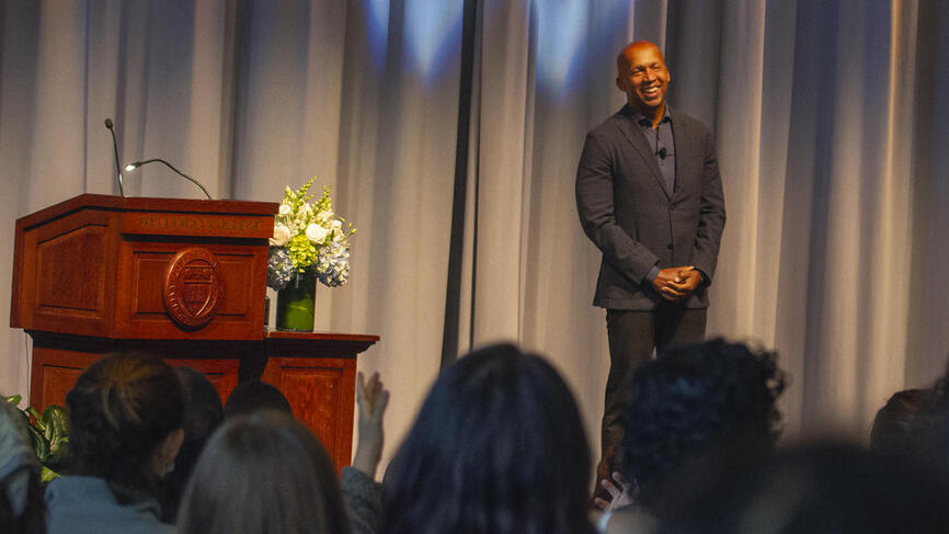 Civil Rights Lawyer Bryan Stevenson smiles while receiving a standing ovation ahead of his talk.