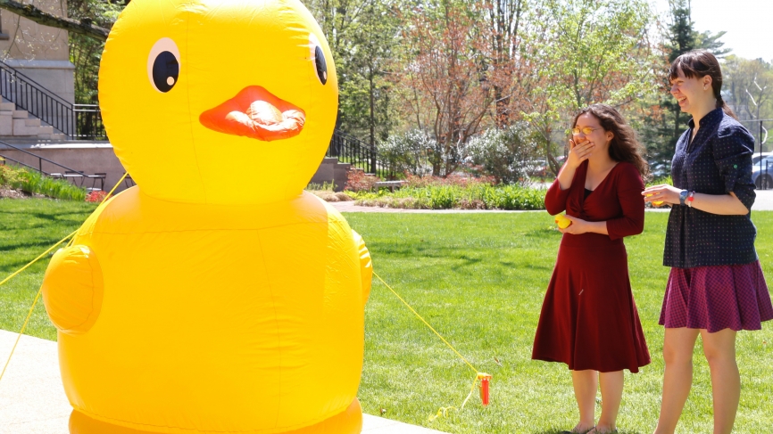 A human sized, blow up duck stands guard outside the Houghton Memorial Chapel