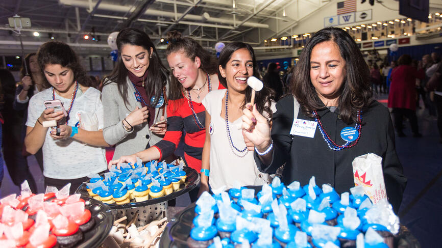 guests enjoy cupcakes with "glass ceiling" garnish