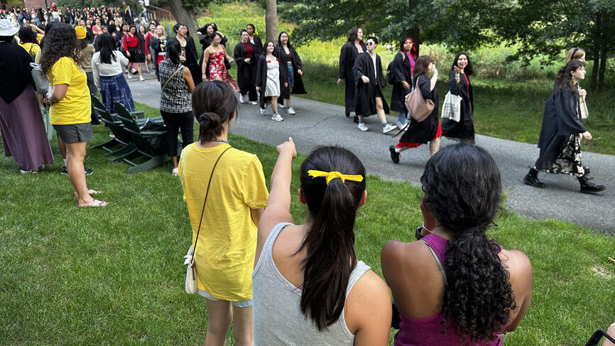 First-years watch as seniors process to Hay Auditorium