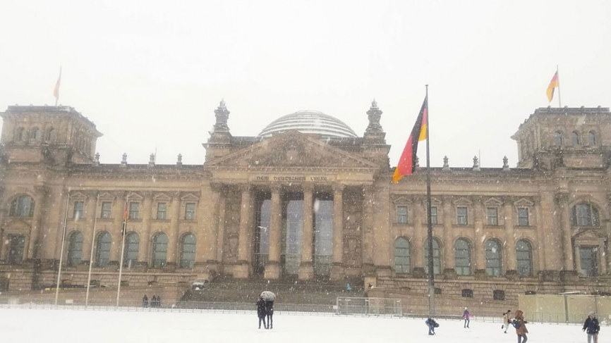 The Reichstag building in the snow.