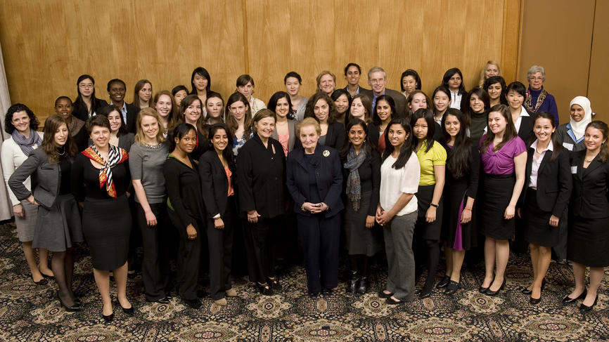 Madeleine K. Albright surrounded by Albright Institute fellows. 