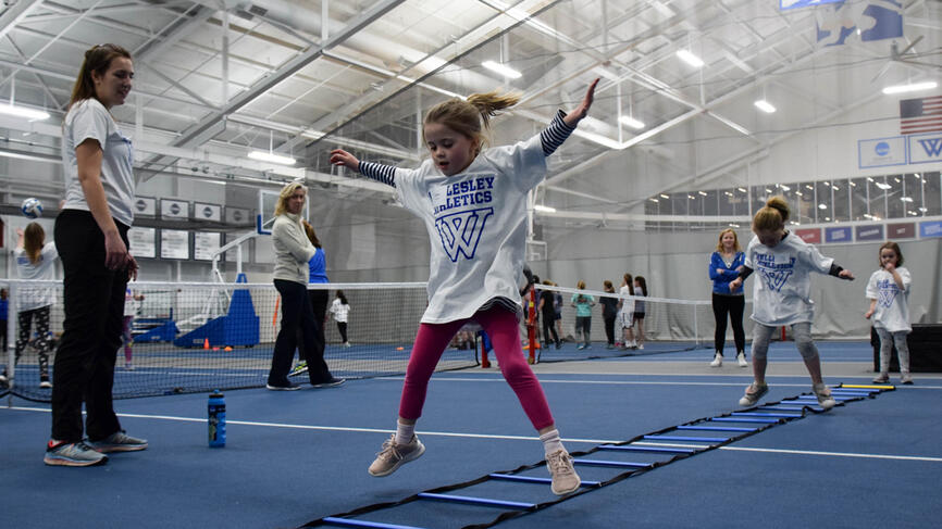 a young girl works through a relay race