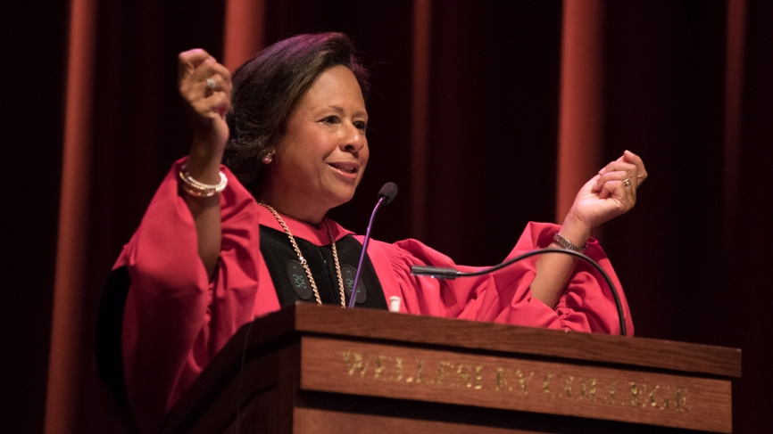 President Paula A. Johnson gives her opening remarks from the podium in Alumnae Auditorium. 