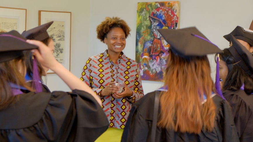 Wellesley commencement speaker Tracy K. Smith gathers with students to robe for the procession.