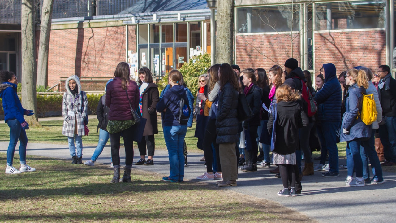 A group of perspective students and their families take a tour of Wellesley during Open Campus.