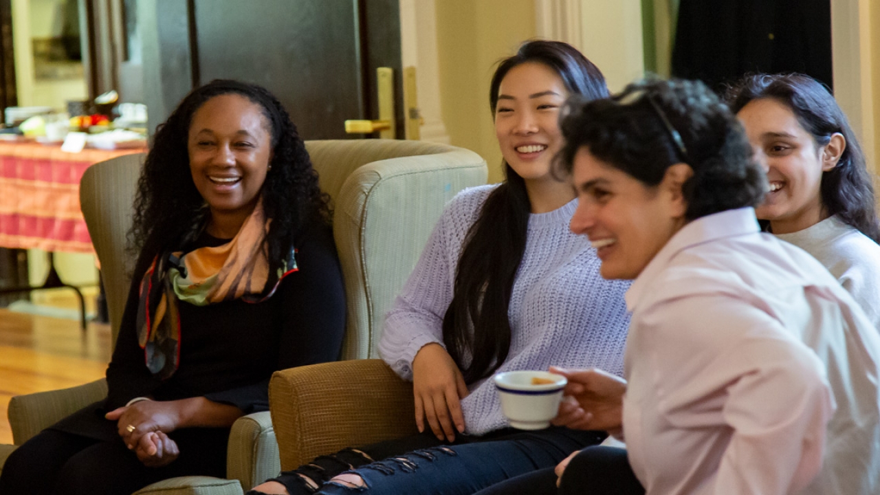 Dean Sendoya chats with students. 