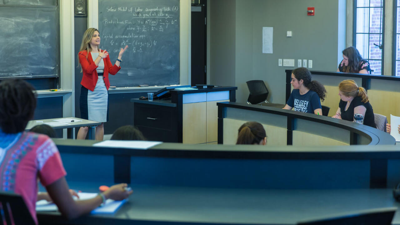 Olga Shurchkov ’01 stands before her class at Wellesley College