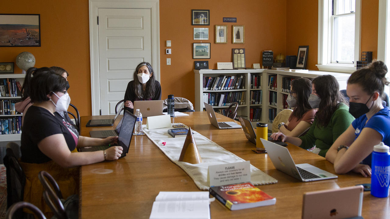 Tracy Gleason, psychology professor and faculty director of Wellesley’s Calderwood program, with students in her classroom.