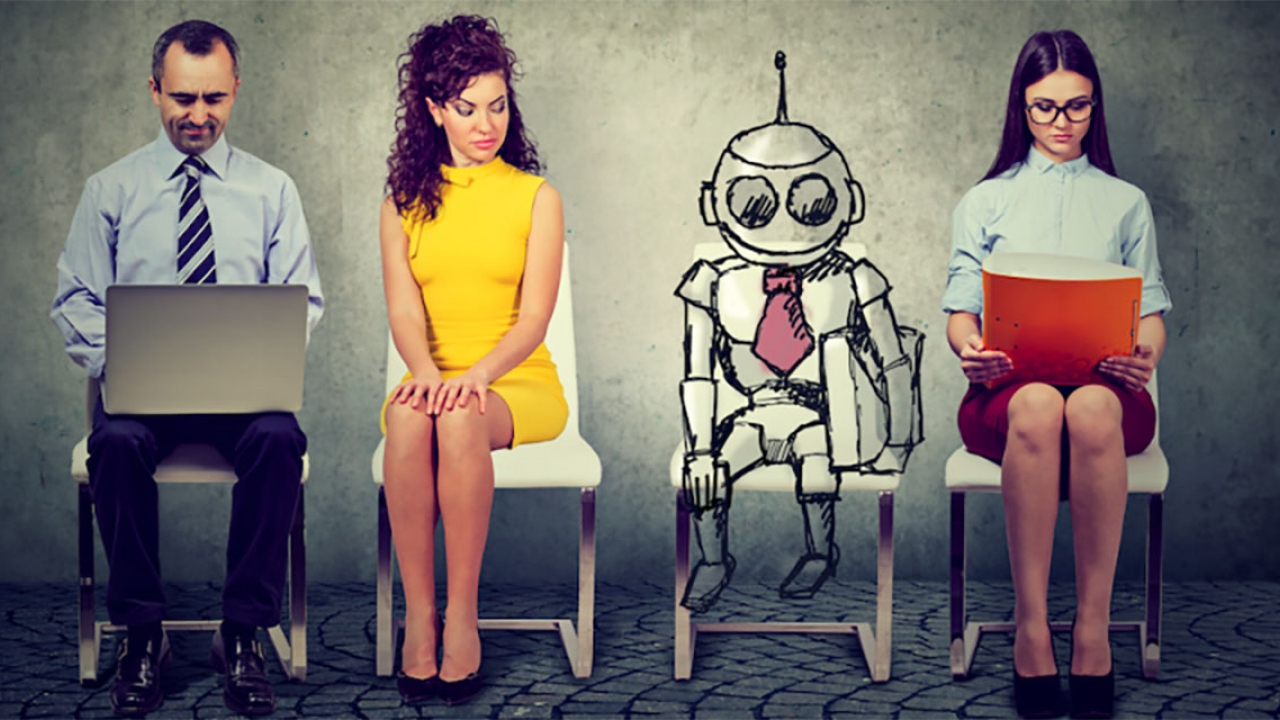 Three humans and a robot sit outside an interview room.