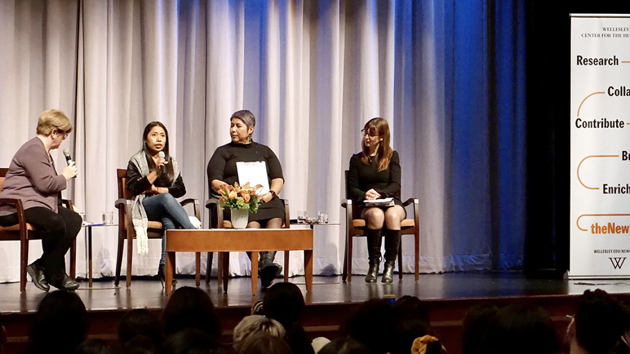 Professors join actress Yalitza Aparicio on stage at Wellesley College for an event.