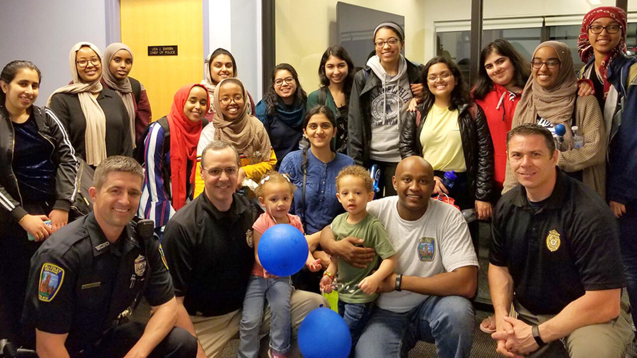 Students and members of the Wellesley College Campus Police pose for a photo.
