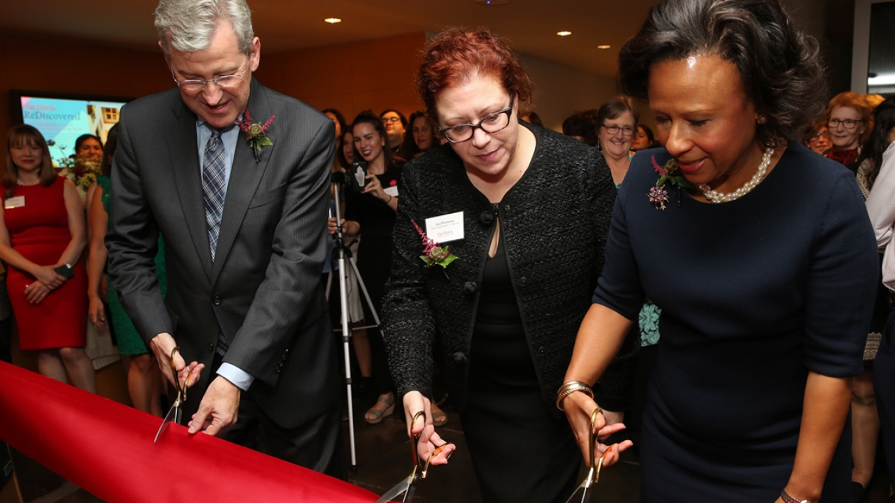 cutting the ribbon to reopen the Davis