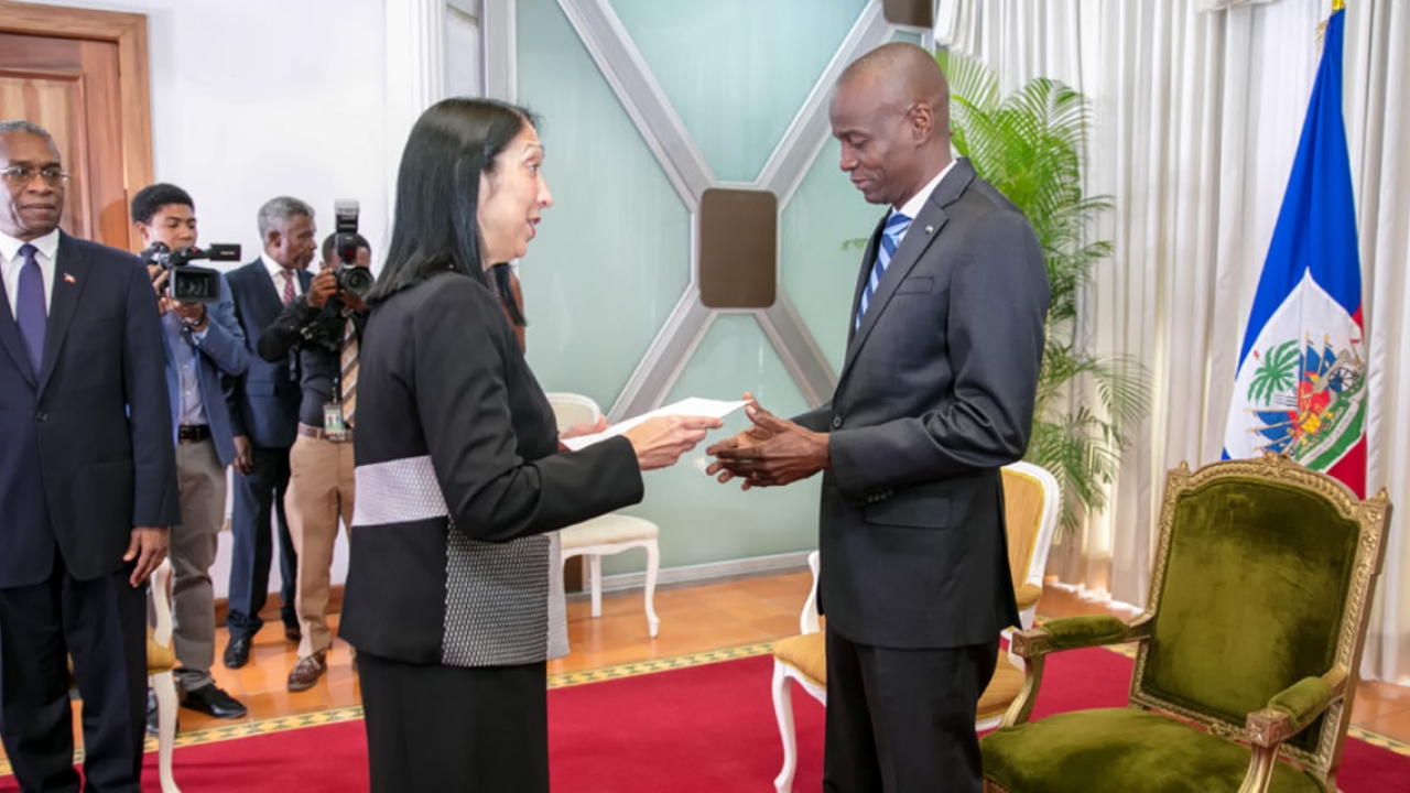 Ambassador Michele Sison '81 presents her credentials to the president of Haiti.