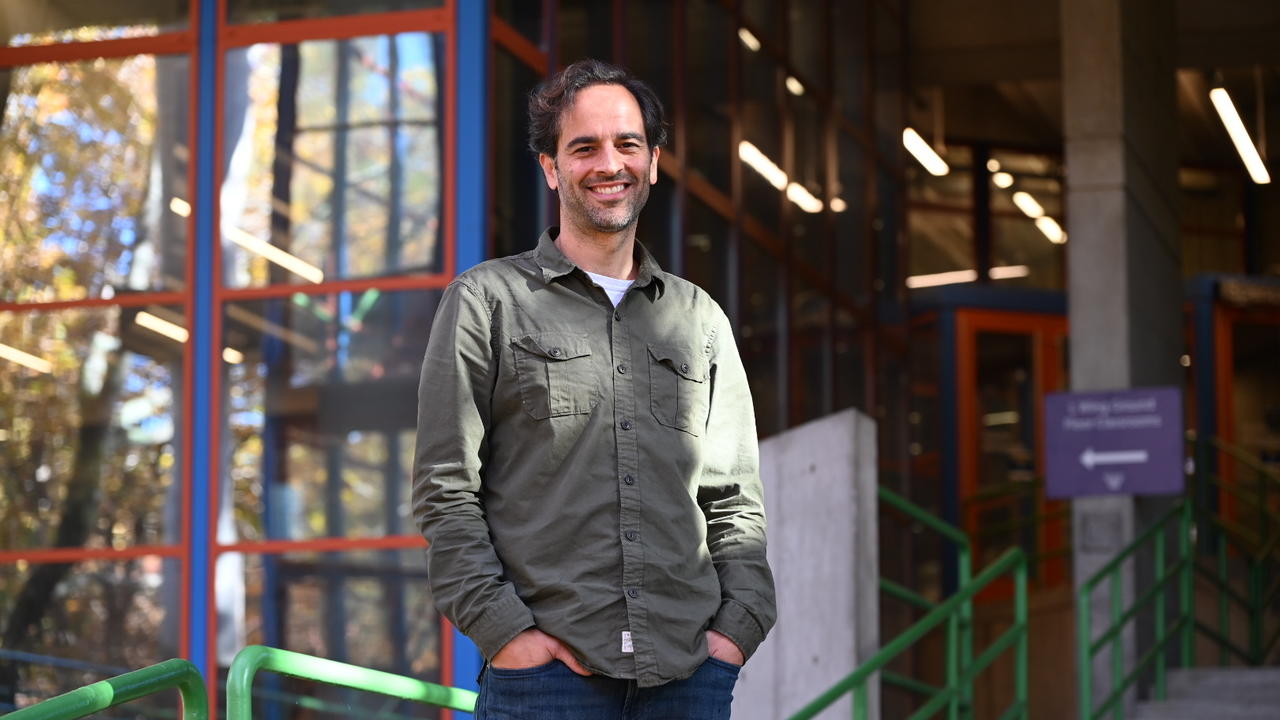 James Battat stands outside the Science Complex