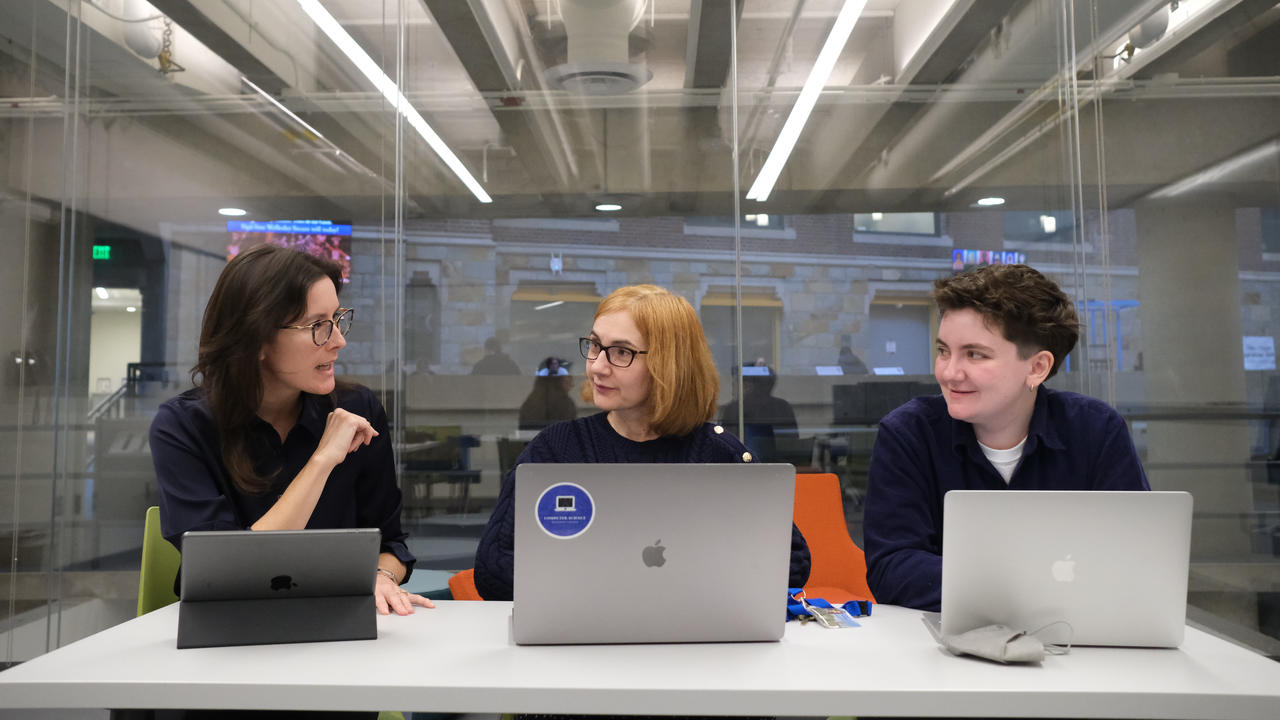 Professors Julie Walsh and Eni Mustafaraj meet with their research associate CJ Larkin.