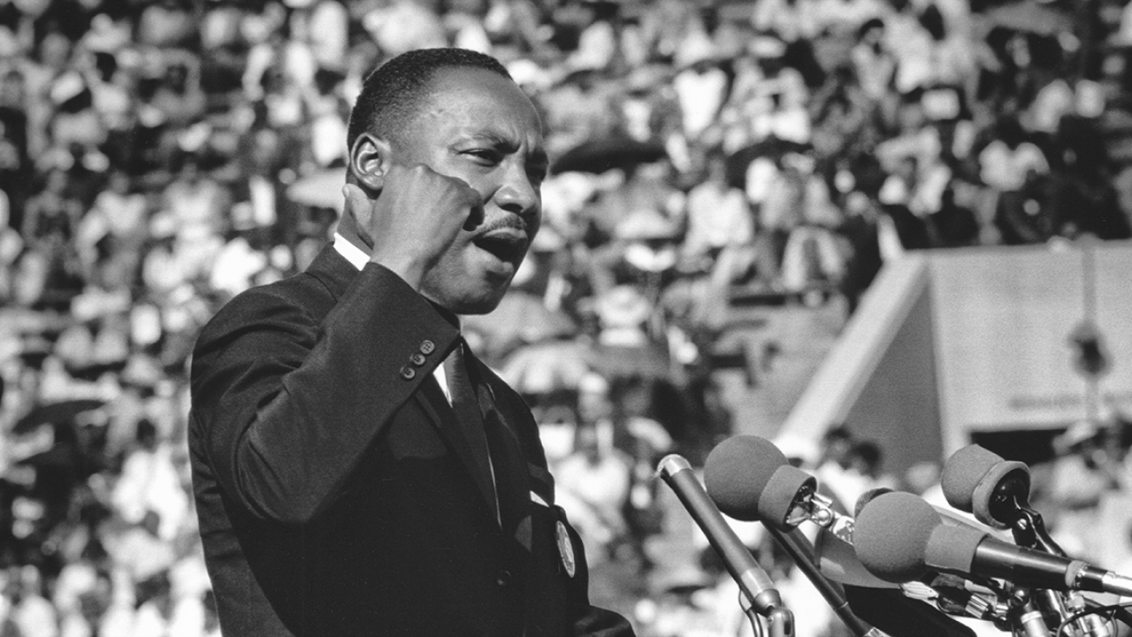 Dr. Martin Luther King makes a speech at the Illinois Rally for Civil Rights at Soldier Field