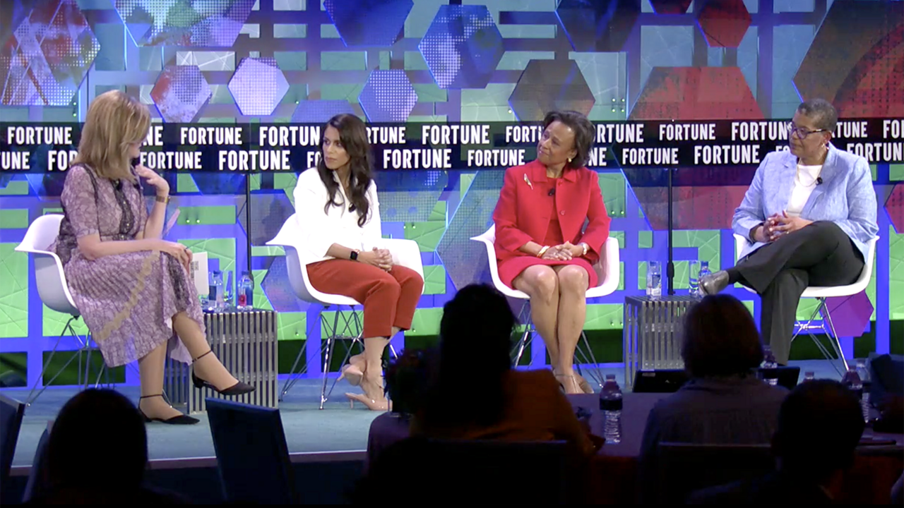 Four women on a stage including Wellesley President Paula A. Johnson.