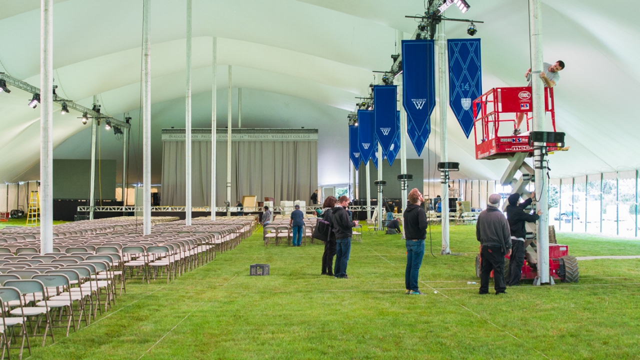 staffers setting up the Inauguration tent