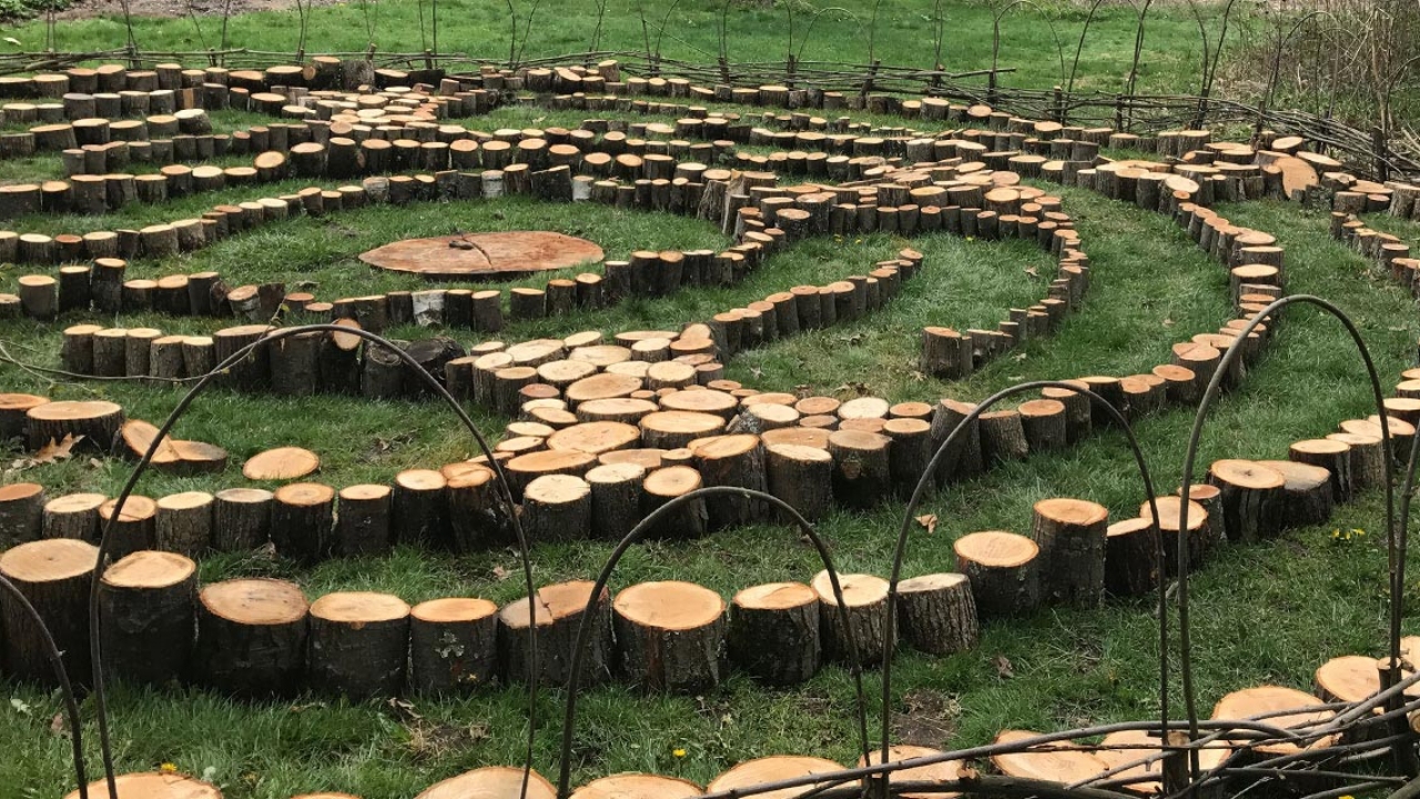 The outdoor labyrinth, which has five concentric rings around the center, is the first of its kind at Wellesley. Measuring roughly 32 feet in diameter, it is constructed from wood rounds and branches from trees that have fallen on campus. 
