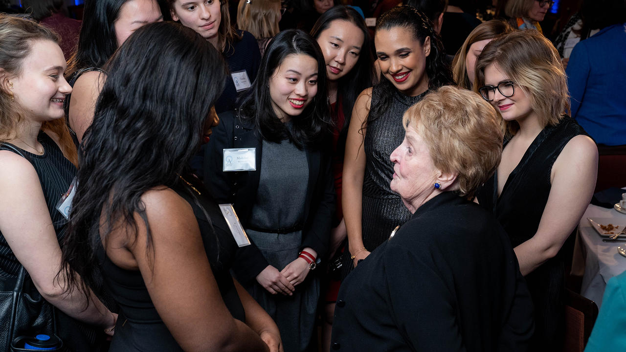 Madeleine K. Albright ’59 MKA surrounded by 2020 Albright Fellows during the closing dinner dialogue.