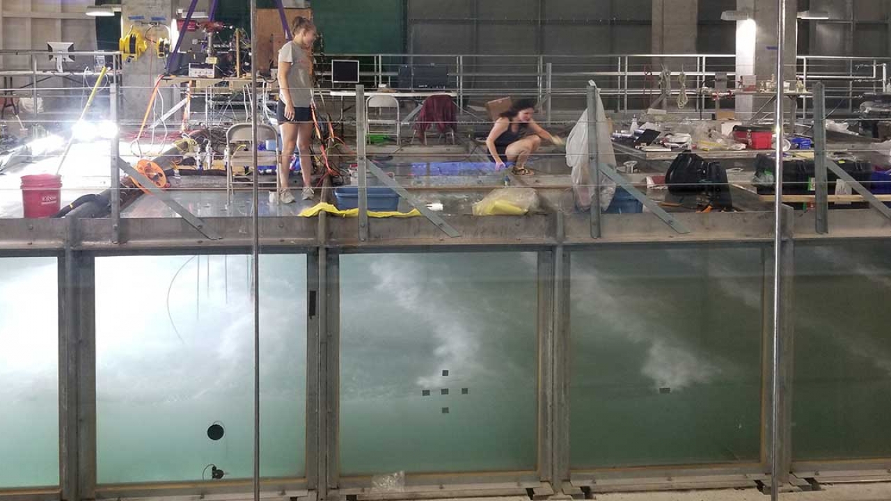 Student researchers use wind-wave tank to simulate the ocean in order to better understand air-to-ocean gas exchange processes. 