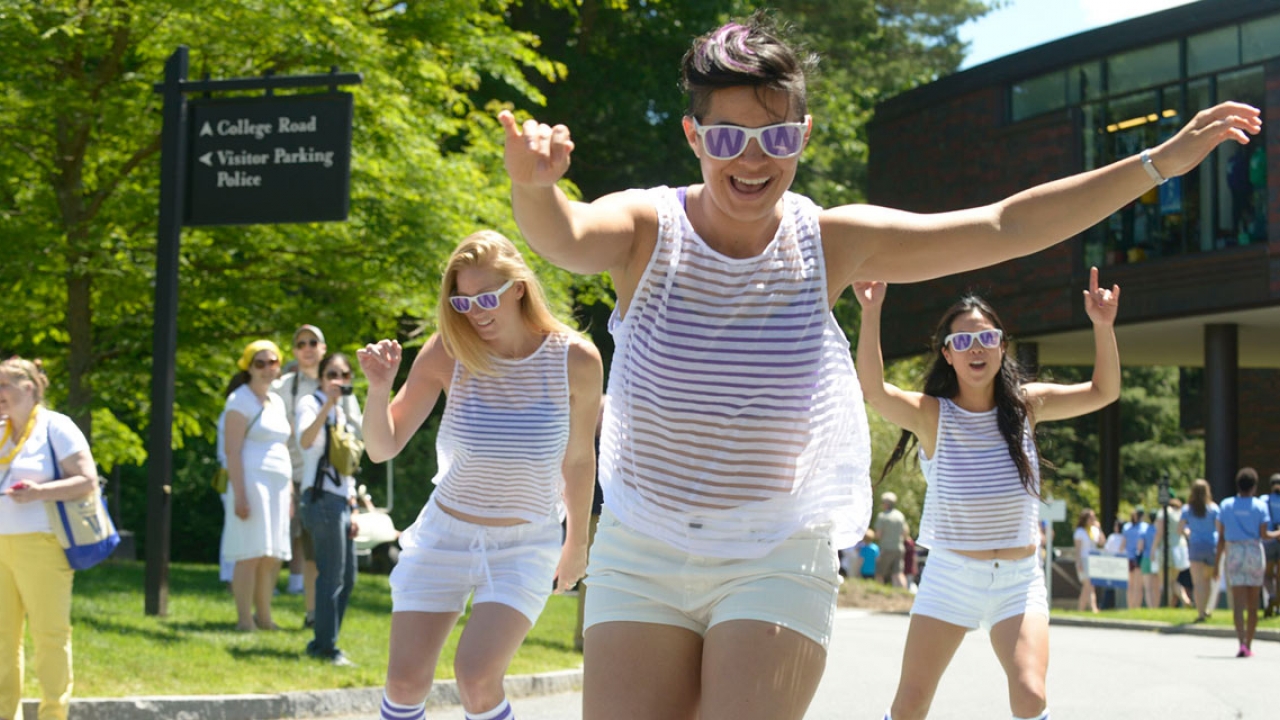 Three Wellesley alumnae skate by LuLu Chow Wang Campus Center at Reunion 2013.