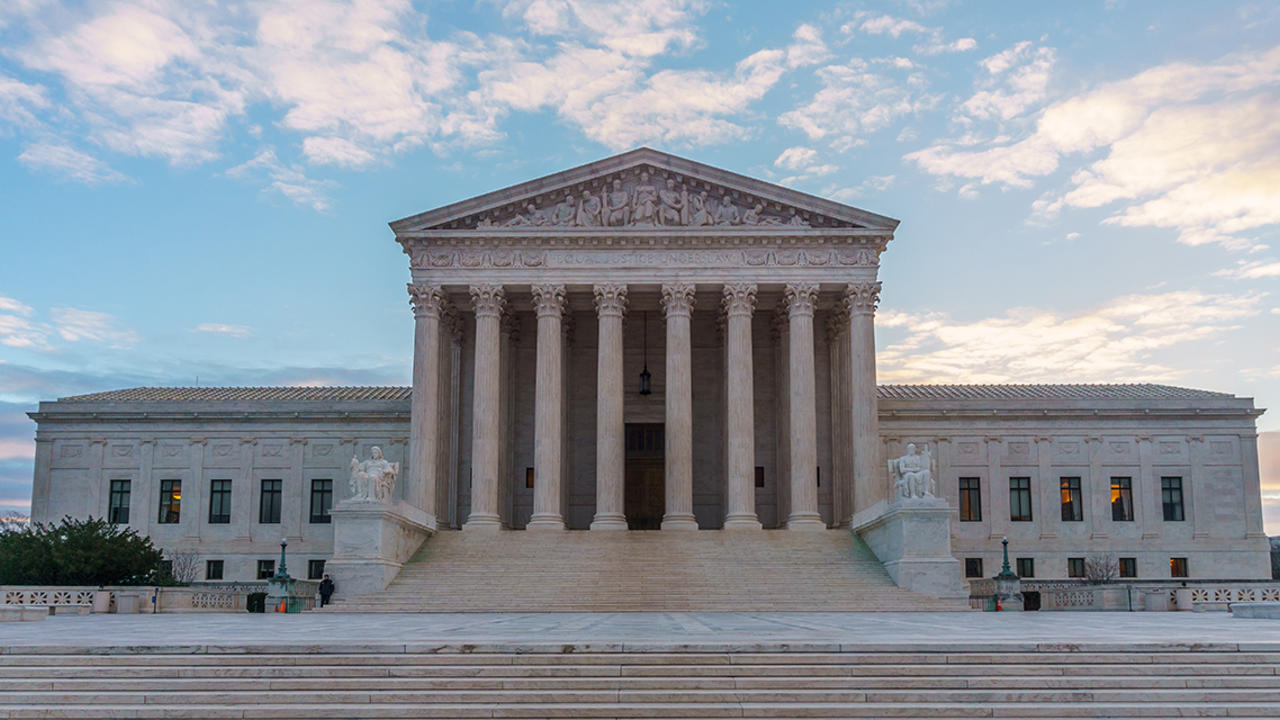 The Supreme Court is seen at dawn.