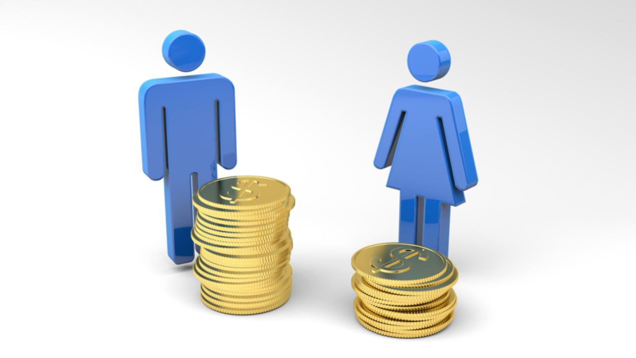 A figure of a man stands next to a stack of coins and a figure of a woman stands next a smaller stack of coins.