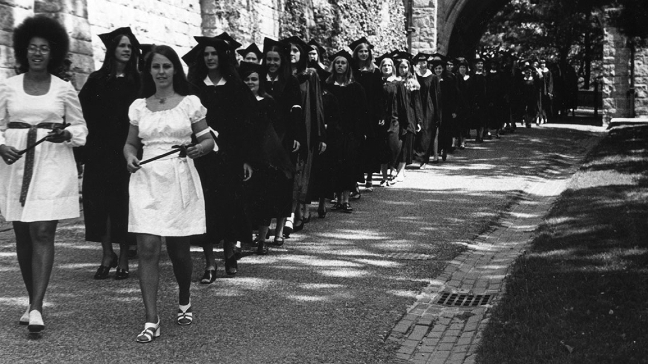 Student marshals lead the baccalaureate procession outside Green Hall during 1972 commencement ceremonies.