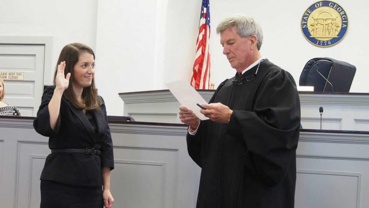 Alex Joseph ’10 being sworn in as a prosecutor