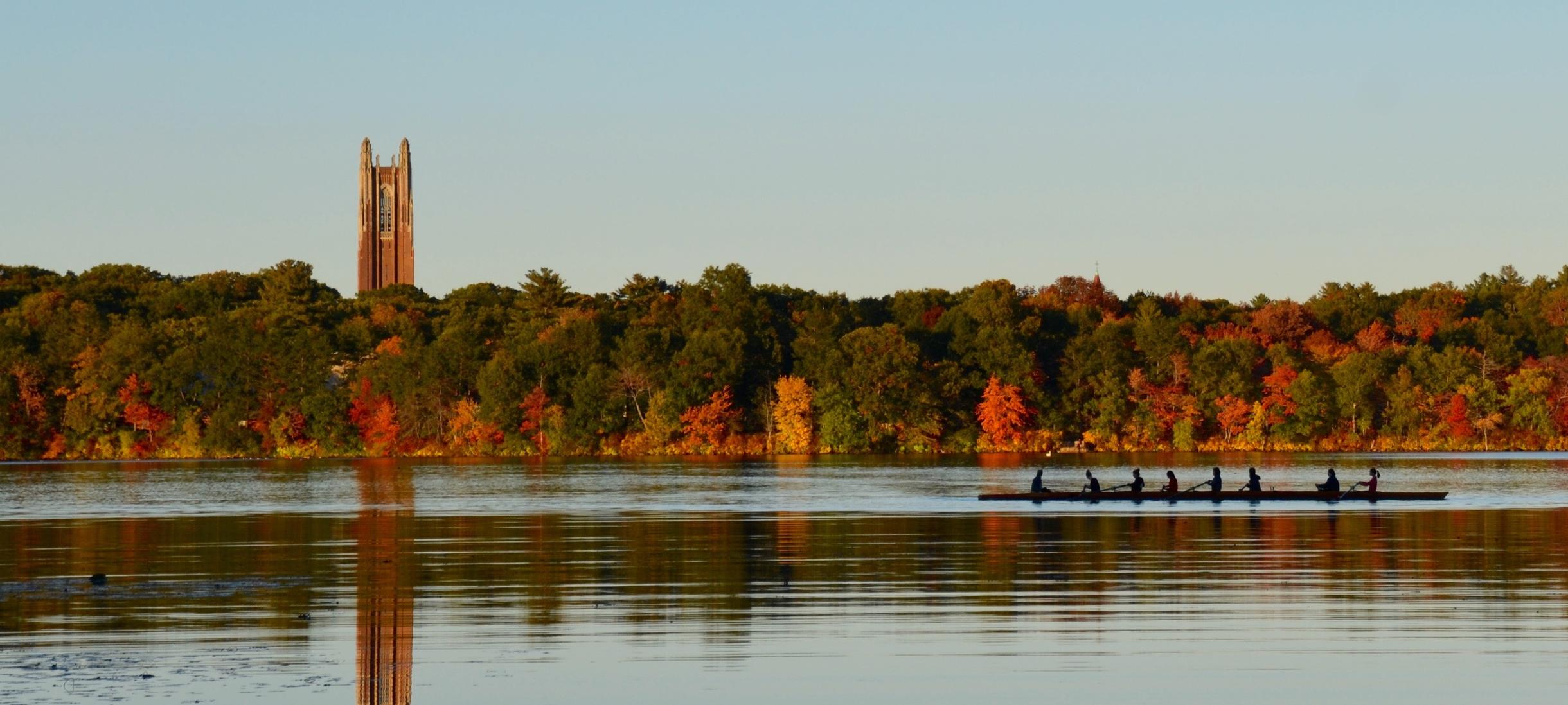 Picture of rowers, Wellesley tower, Lake Waban, autumn.