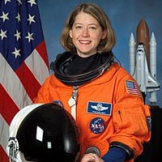 Pam Melroy with astronaut gear