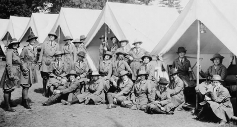 WWI women in front of tents 